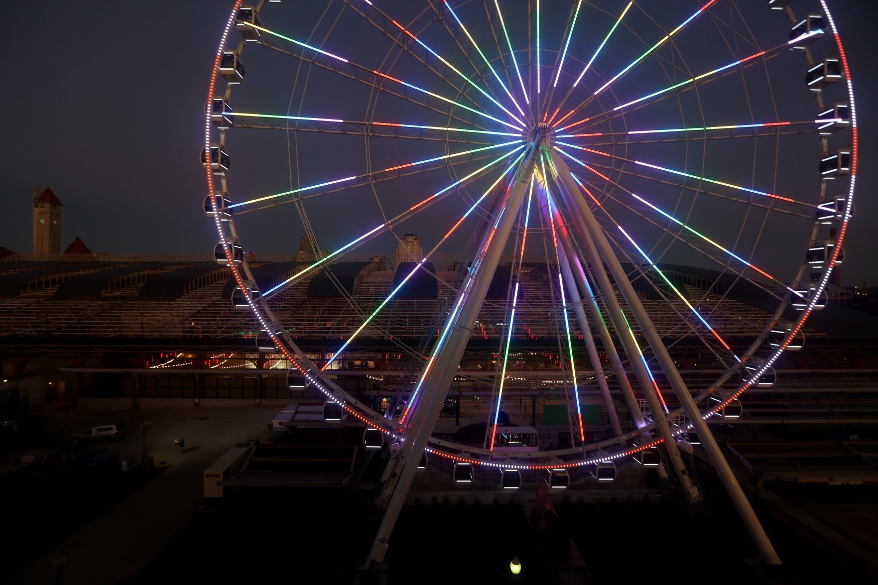 The St. Louis Wheel at Union Station lights up the sky